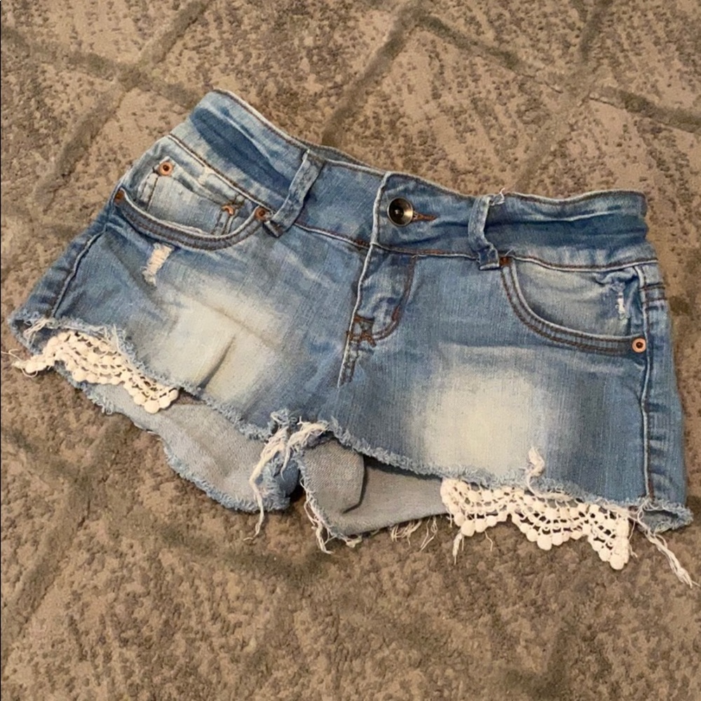2b BEBE Denim shorts with crochet lace details